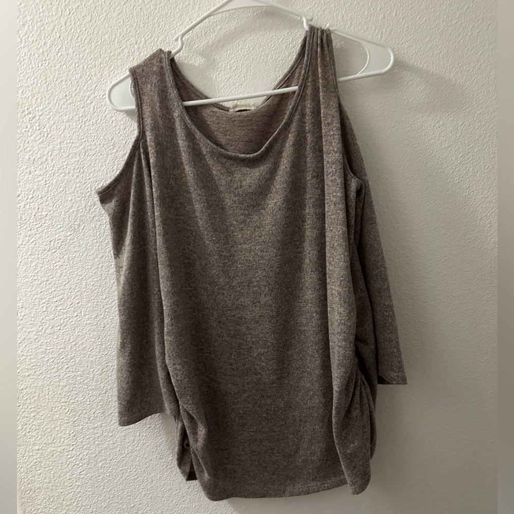 Tan blouse w/ shoulder cut out. Size L.